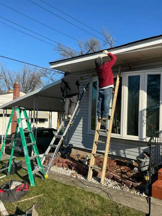 Restoration crew performing exterior repair in Osceola